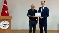 Ulaş’ta Korubaşı Köyü Muhtarına Çevre Çalışmaları Nedeniyle Teşekkür Belgesi