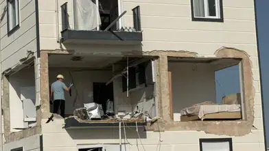 Evde patlayan tüp binayı harabeye çevirdi